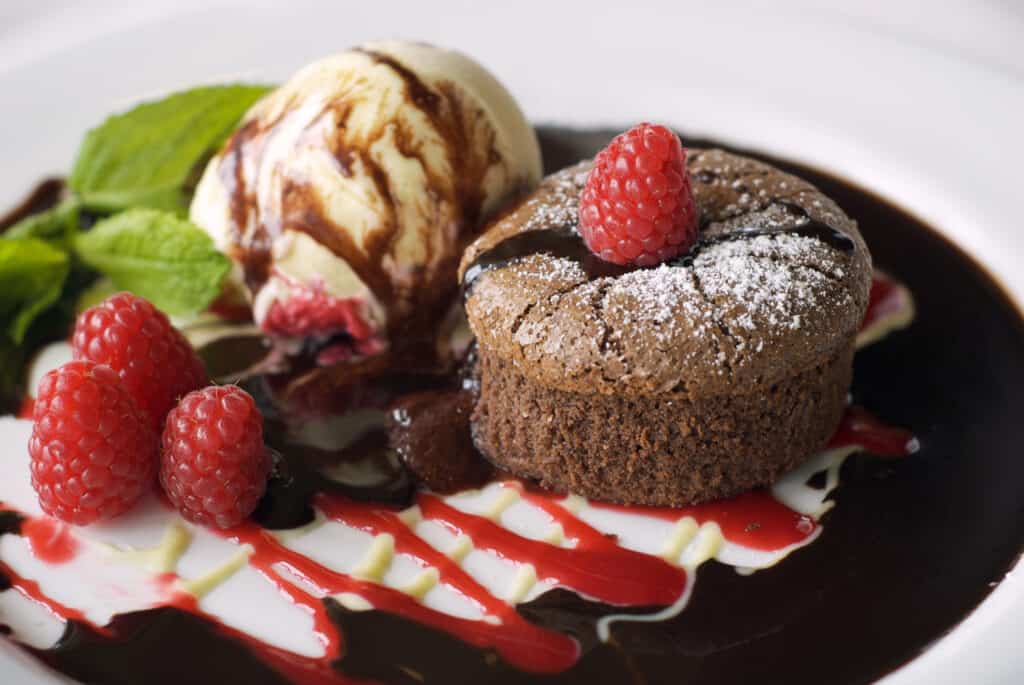 chocolate fondant served with ice cream and fruits