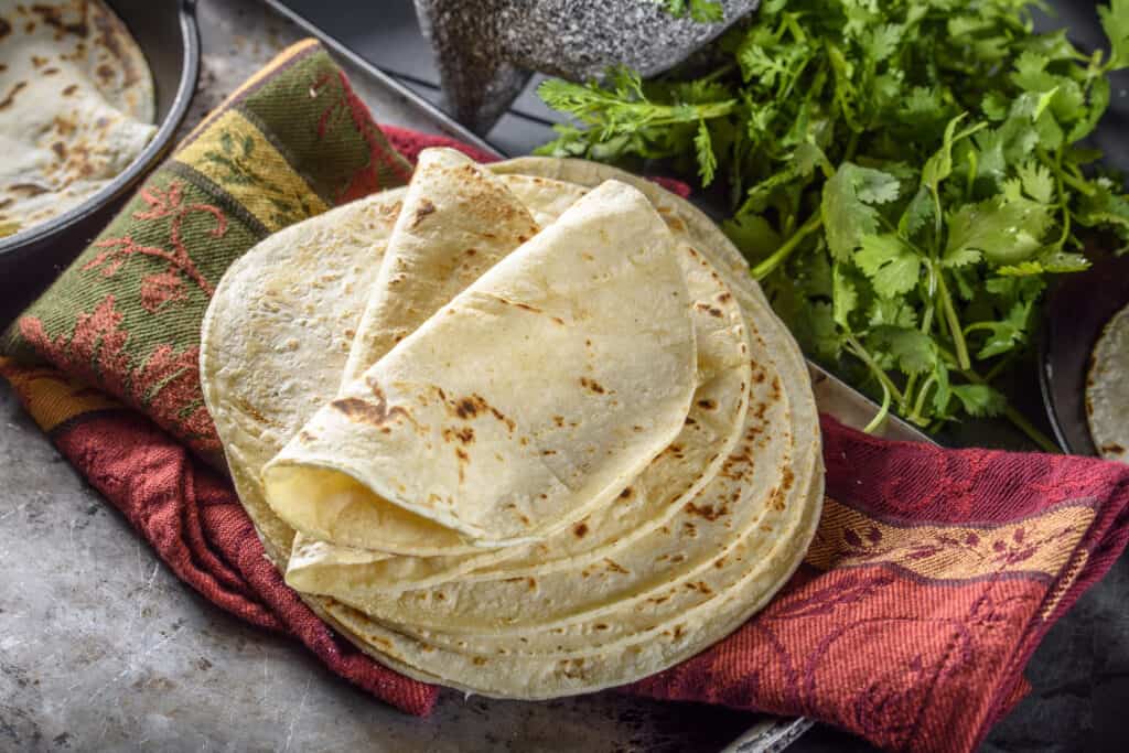 gluten free tortillas piled above each other 