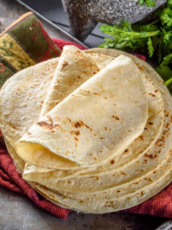 freshly baked gluten-free tortillas piled above each other