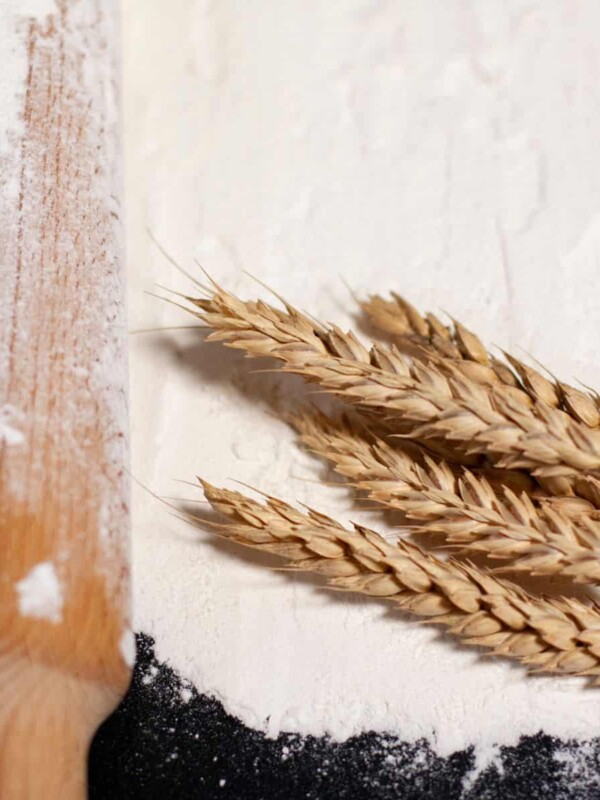 flour and spikelets of wheat for baking bread