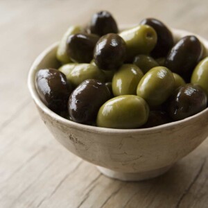 By following basic steps, you can make a tasty pickled olive that will complement many foods in your daily meal.
