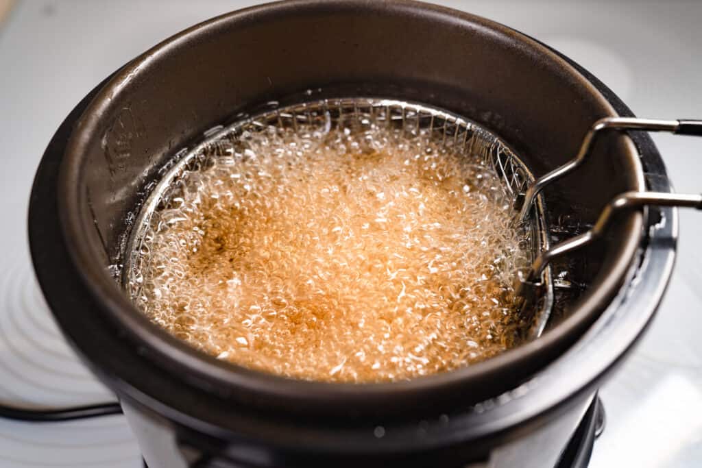 Frying Samosa in a boiling oil.