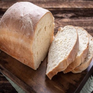 a sliced loaf of homemade white bread made with the 10 minute dough