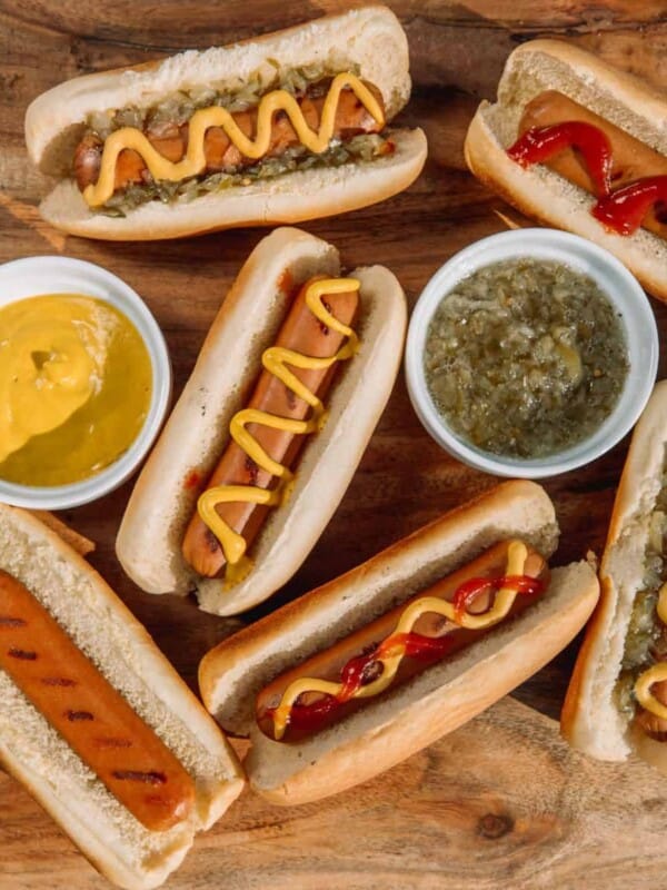 hot dog sandwiches customized with different toppings and sauces