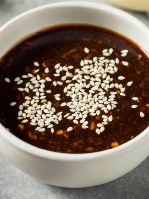 soy sauce with sesame in a white bowl
