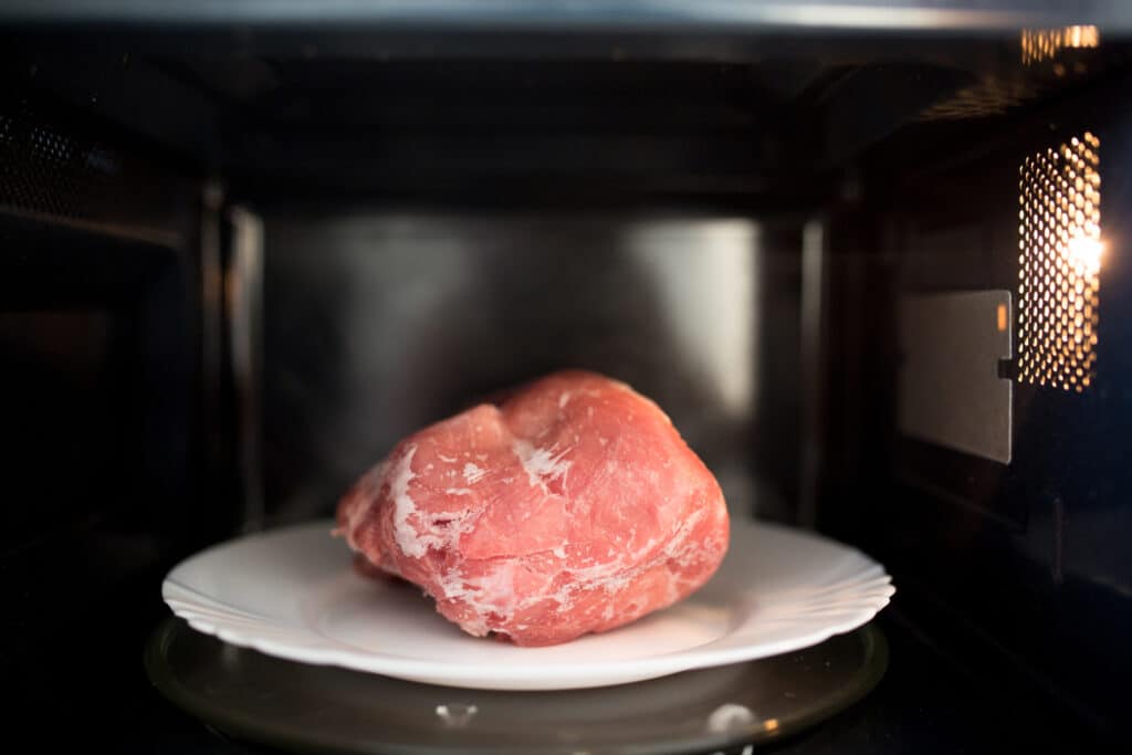 defrosting meat in the microwave