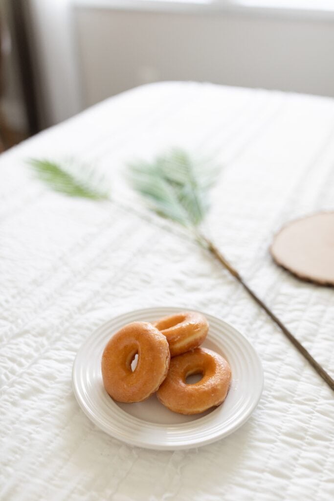 three air-fried biscuit donuts made to golden perfection