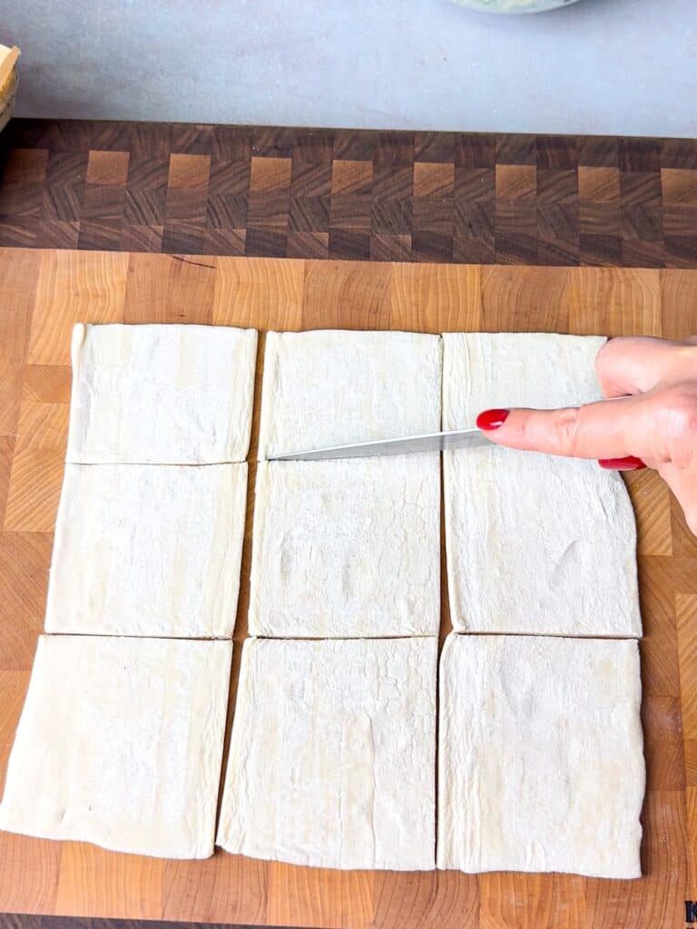 puff pastry dough cut into nine squares