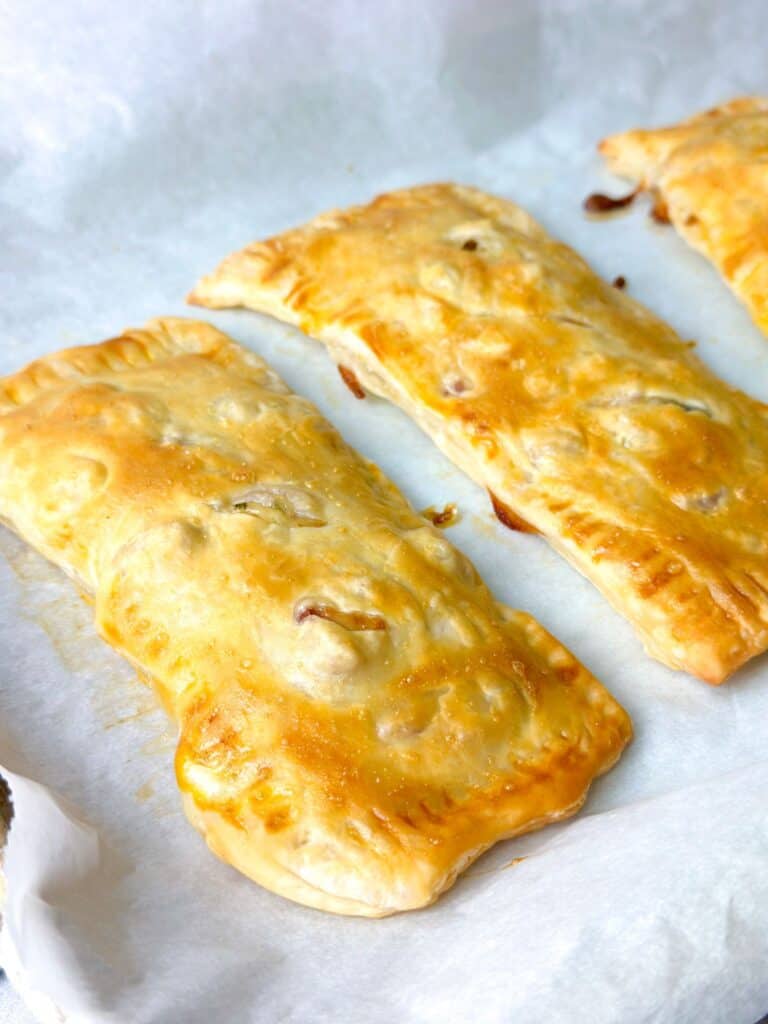 two golden and flaky puff pastry rectangles