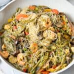 A mouthwatering shrimp stir fry with an array of fresh ingredients, cooked to perfection.