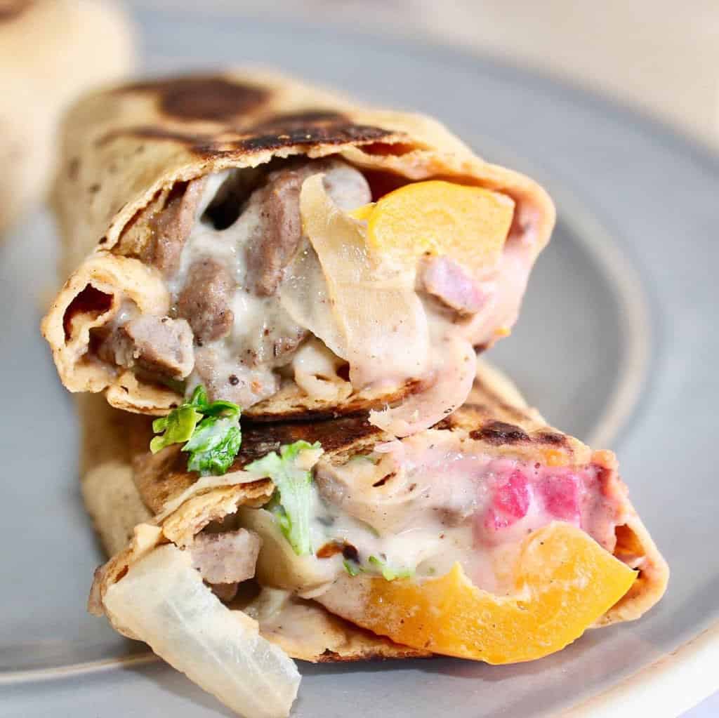 A healthy lunch shawarma sandwich idea, cut in two!
