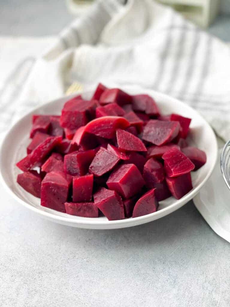 cubed boiled beets in a white bowl