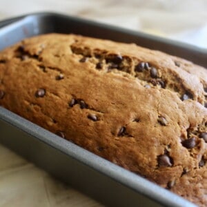 Chocolate Chip Banana Bread loaf introducing a light mix of flour, milk, bananas, spices, and tasty chocolate chip