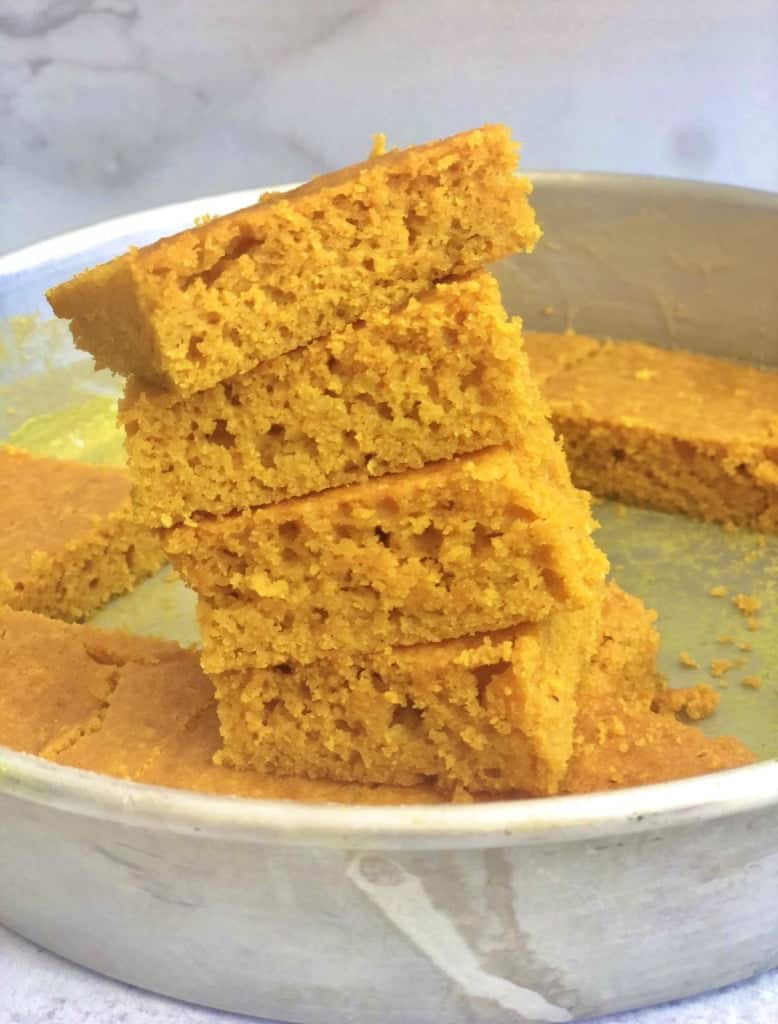 a pan of low Carb Turmeric Cake or Sfoof made with egg whites, almond flour, and turmeric spice
