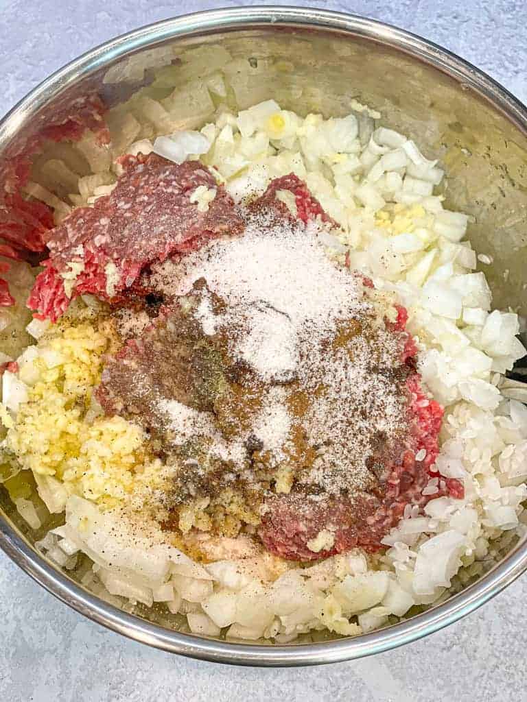 the stuffing mixture for malfoof (stuffed/rolled cabbage) including minced meat, garlic, and spices
