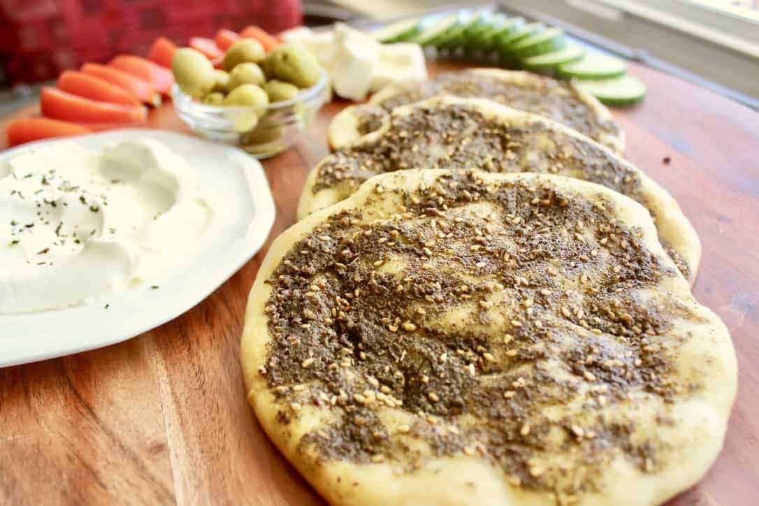 The dry zaatar mixture is often sprinkled on a plate of labneh or over cheese sandwich in a middle eastern flatbread.