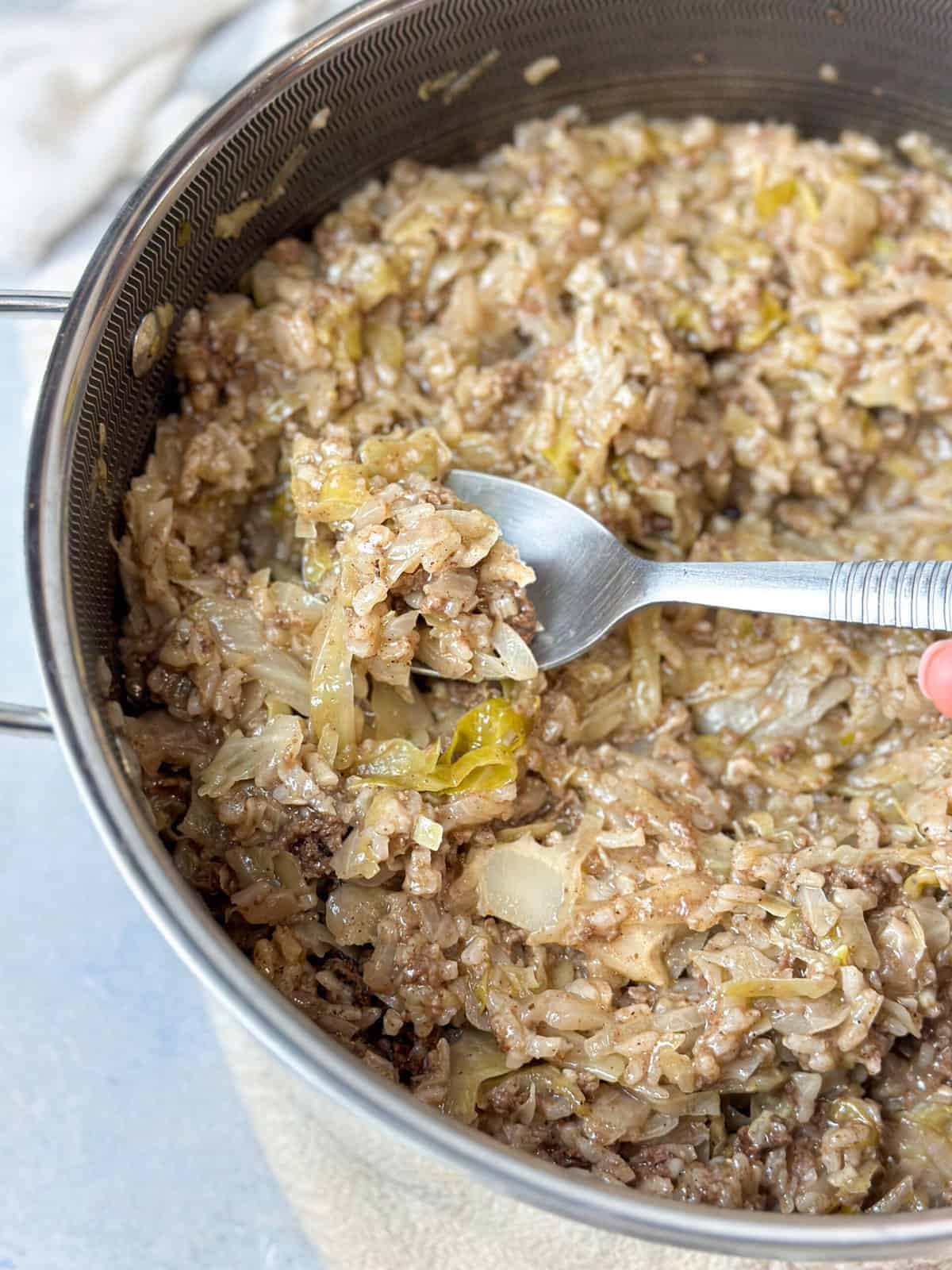 a spoon of unstuffed cabbage with rice and ground beef