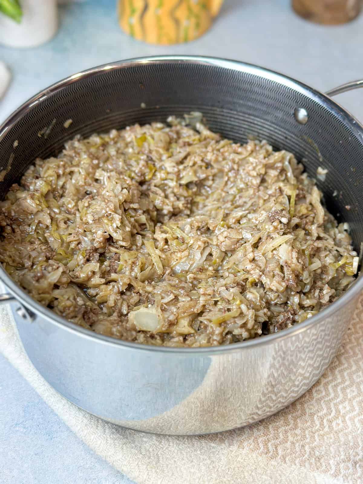 a pot of Lebanese unstuffed cabbage (Malfoof) recipe with rice and ground beef