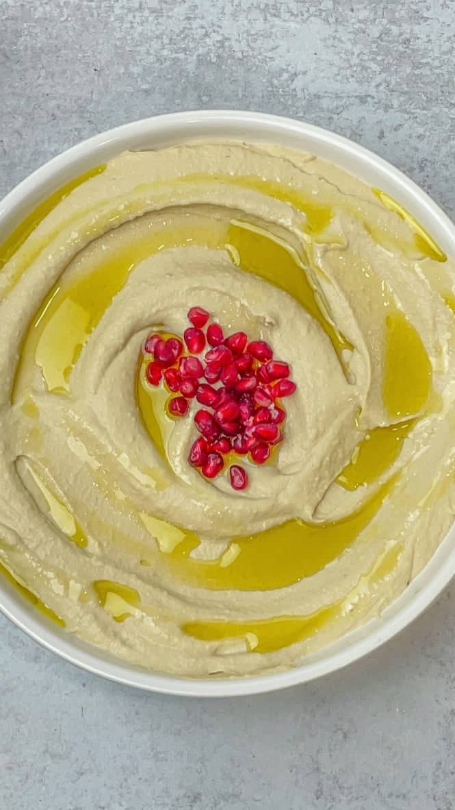 Perfectly creamy hummus with tahini ready to be served.