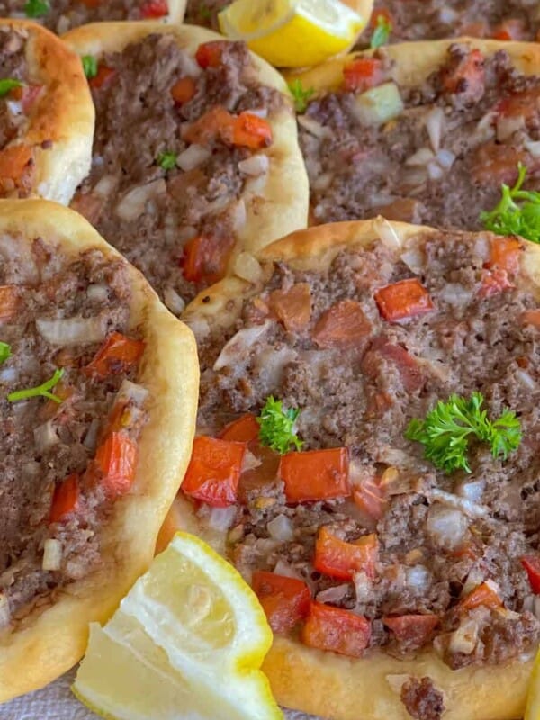 Thin, soft dough topped with seasoned ground meat with veggies bursts with a tangy delicious flavor