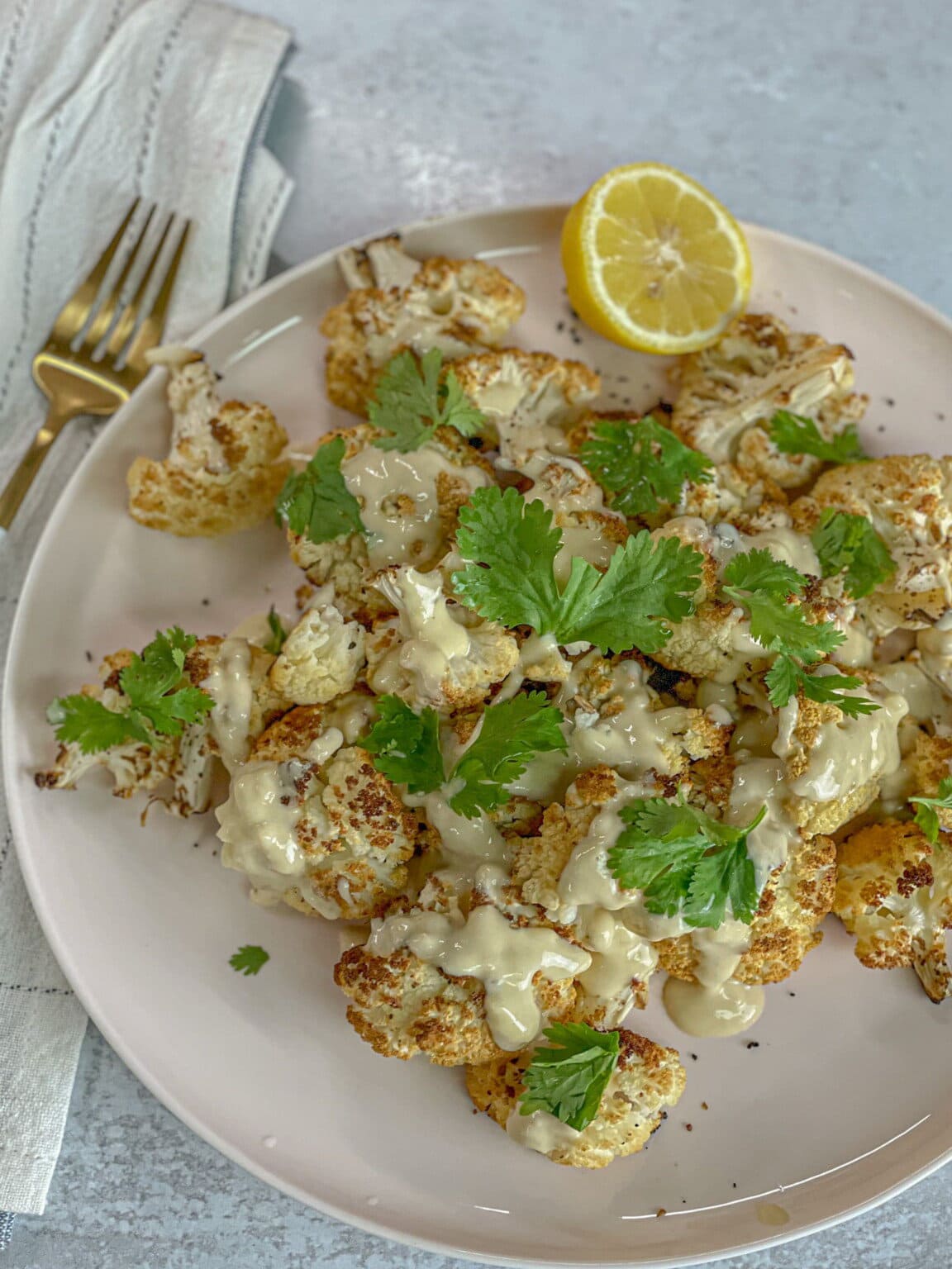 TasteGreatFoodie - Spicy Roasted Cauliflower with Tahini Dressing - Vegan