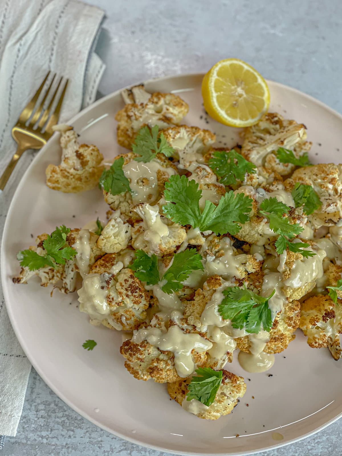 TasteGreatFoodie - Spicy Roasted Cauliflower with Tahini Dressing - Vegan