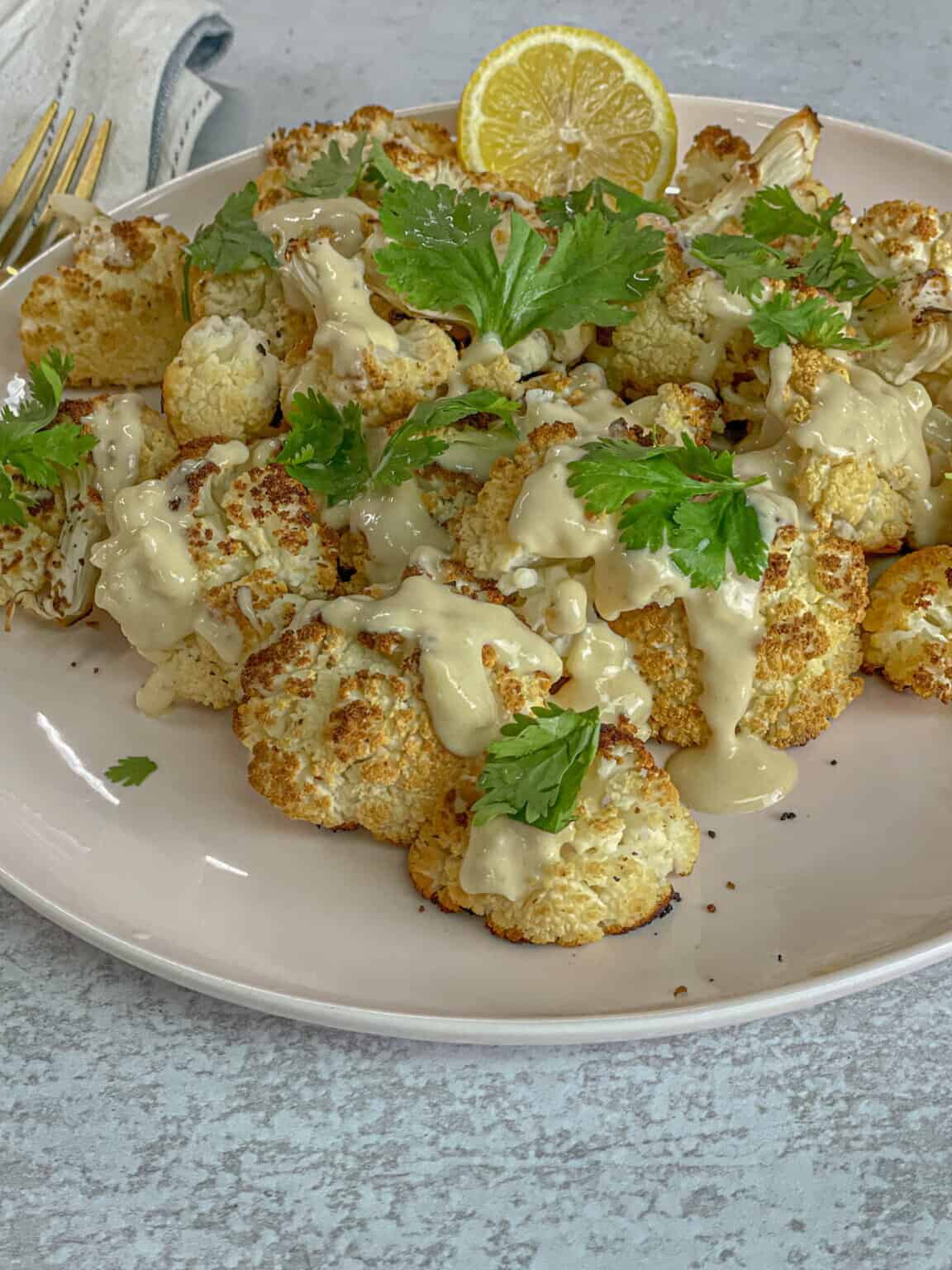TasteGreatFoodie - Spicy Roasted Cauliflower with Tahini Dressing - Vegan
