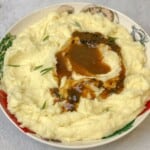 a plate of mashed potatoes topped with delicious homemade gravy