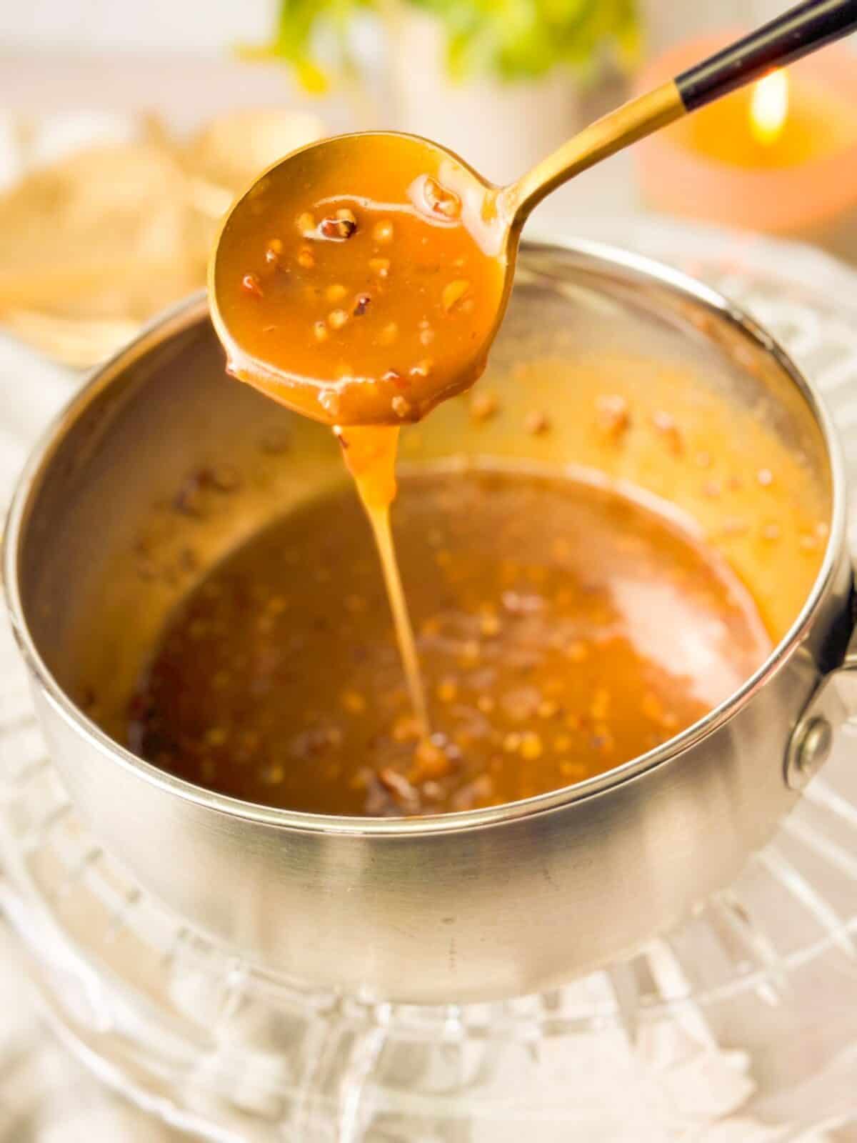 This image has an empty alt attribute; its file name is butterscotch-sauce-1200x1600.jpeg