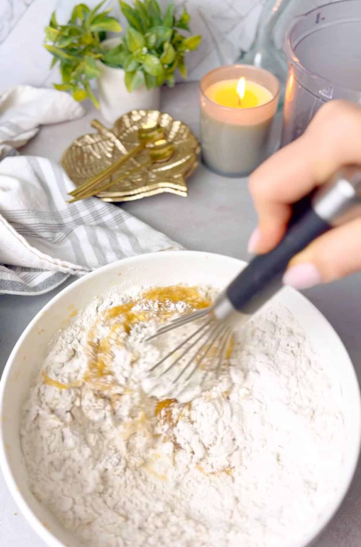 vanilla, olive oil, and butter mixture mixed with eggs, flour, and salt