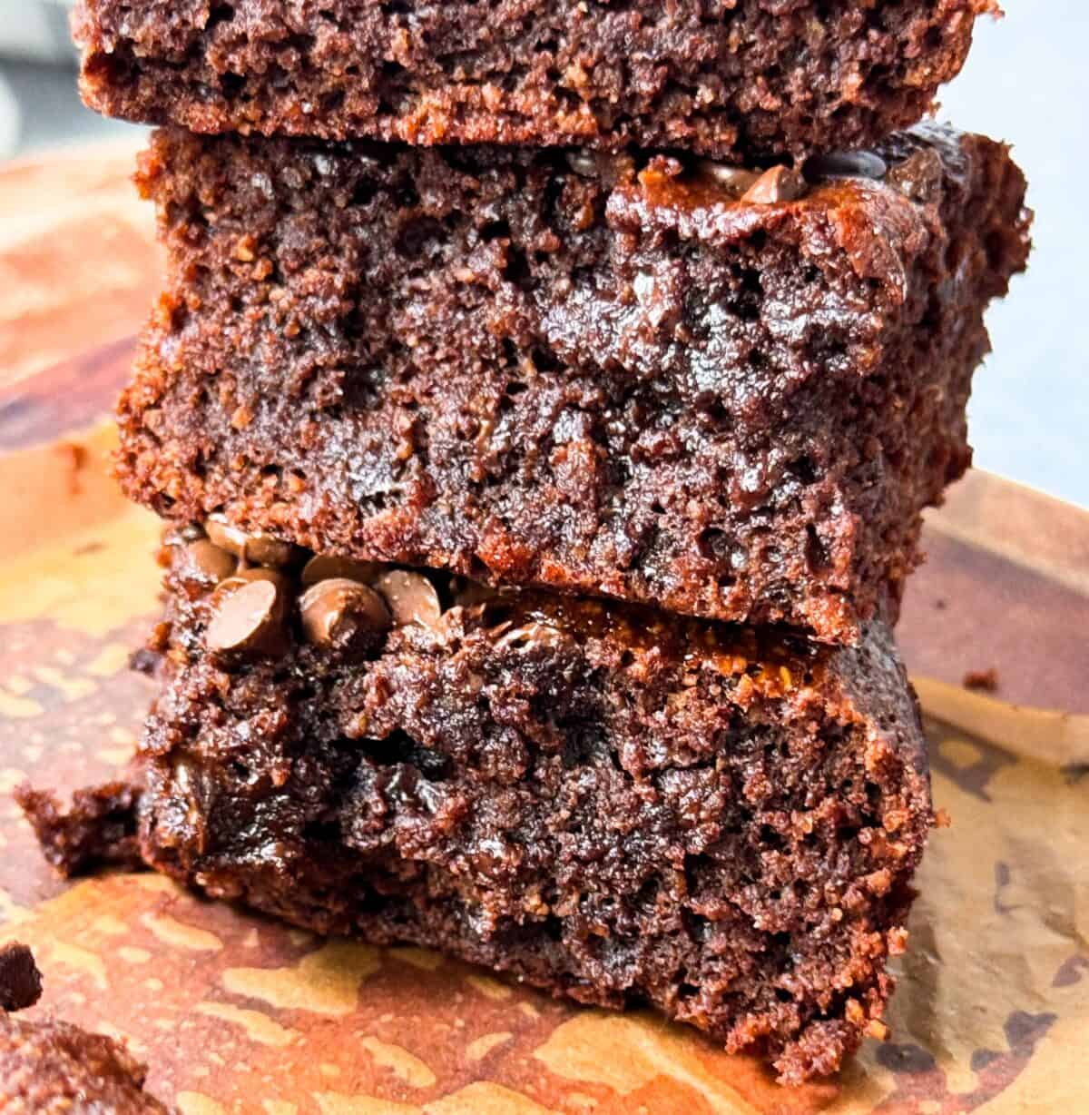 a stack of fudgy almond flour brownies