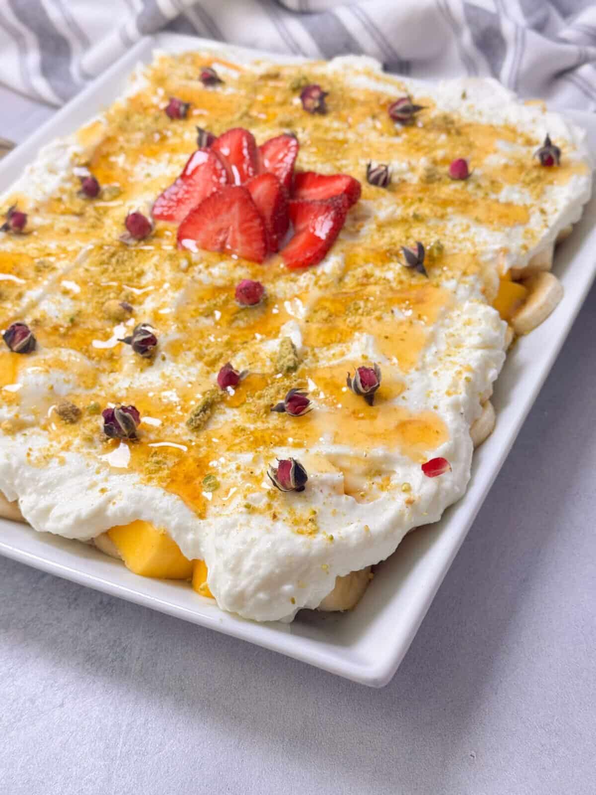 No Bake Fresh Fruit Cake no-bake fresh fruit cake with ashta cream served in a pan