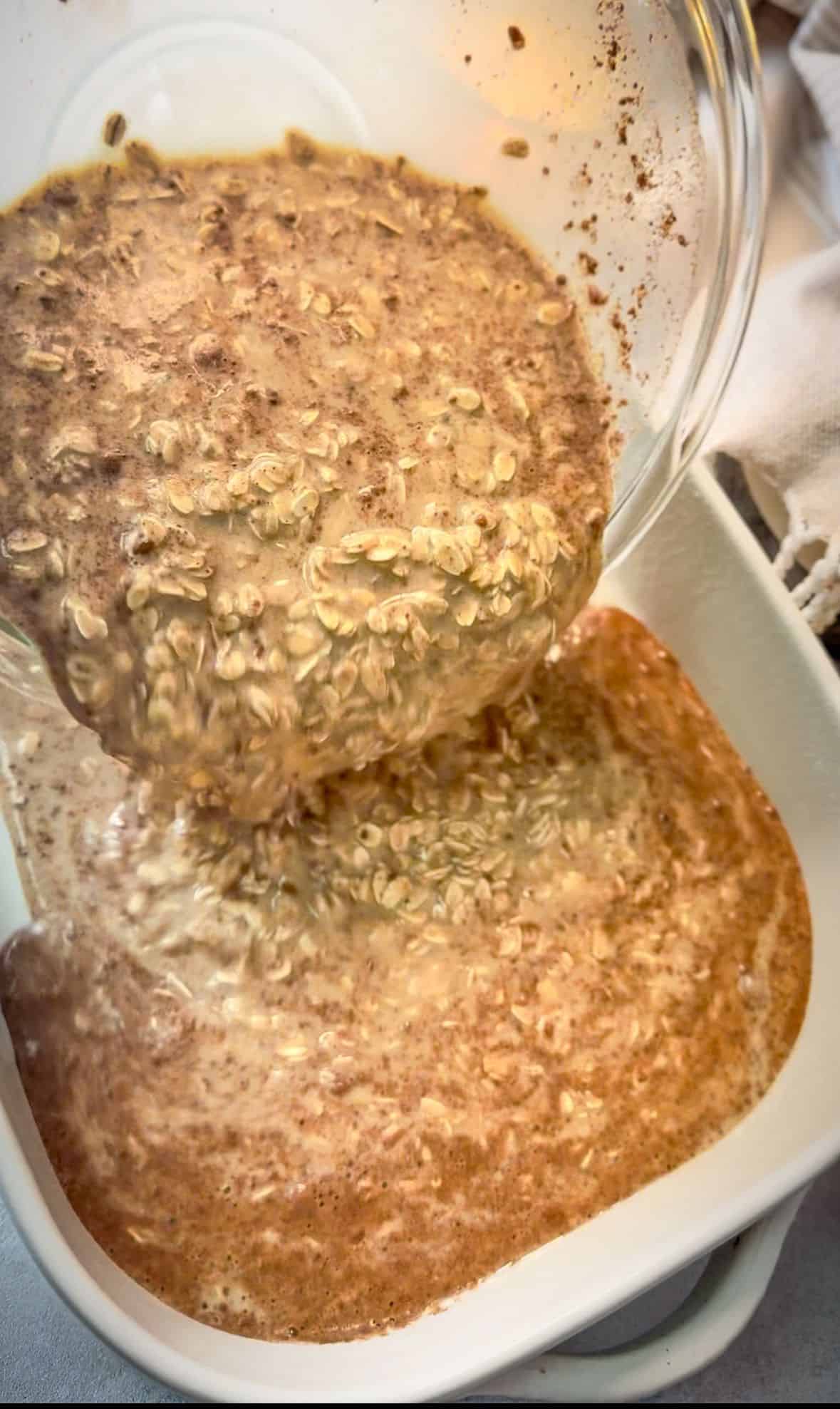 How to Make Apple Cinnamon Baked Oatmeal pour oatmeal mixture into pan