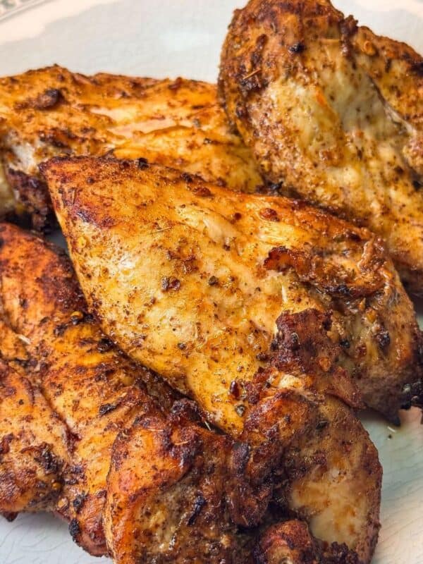 tender juicy air fryer chicken breast served on a large platter