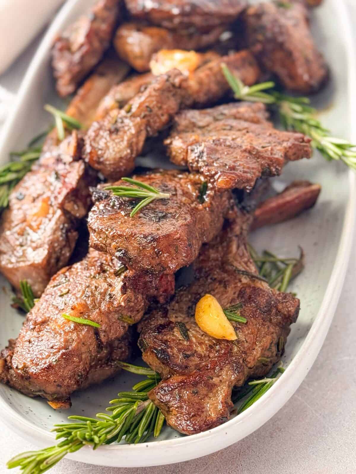 Garlic Rosemary Lamb Chops Recipe Golden brown grilled lamb chops with garlic and rosemary, served hot and ready to enjoy