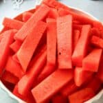 juicy, refreshing watermelon sticks served in a large bowl