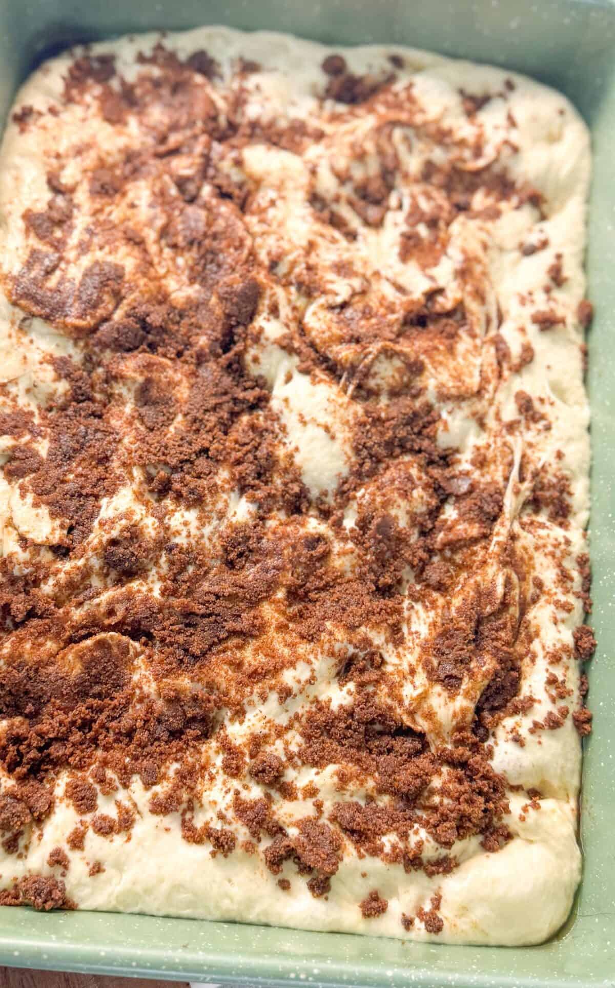 How to Make Cinnamon Roll Focaccia at Home Spread the remaining filling evenly over the surface.