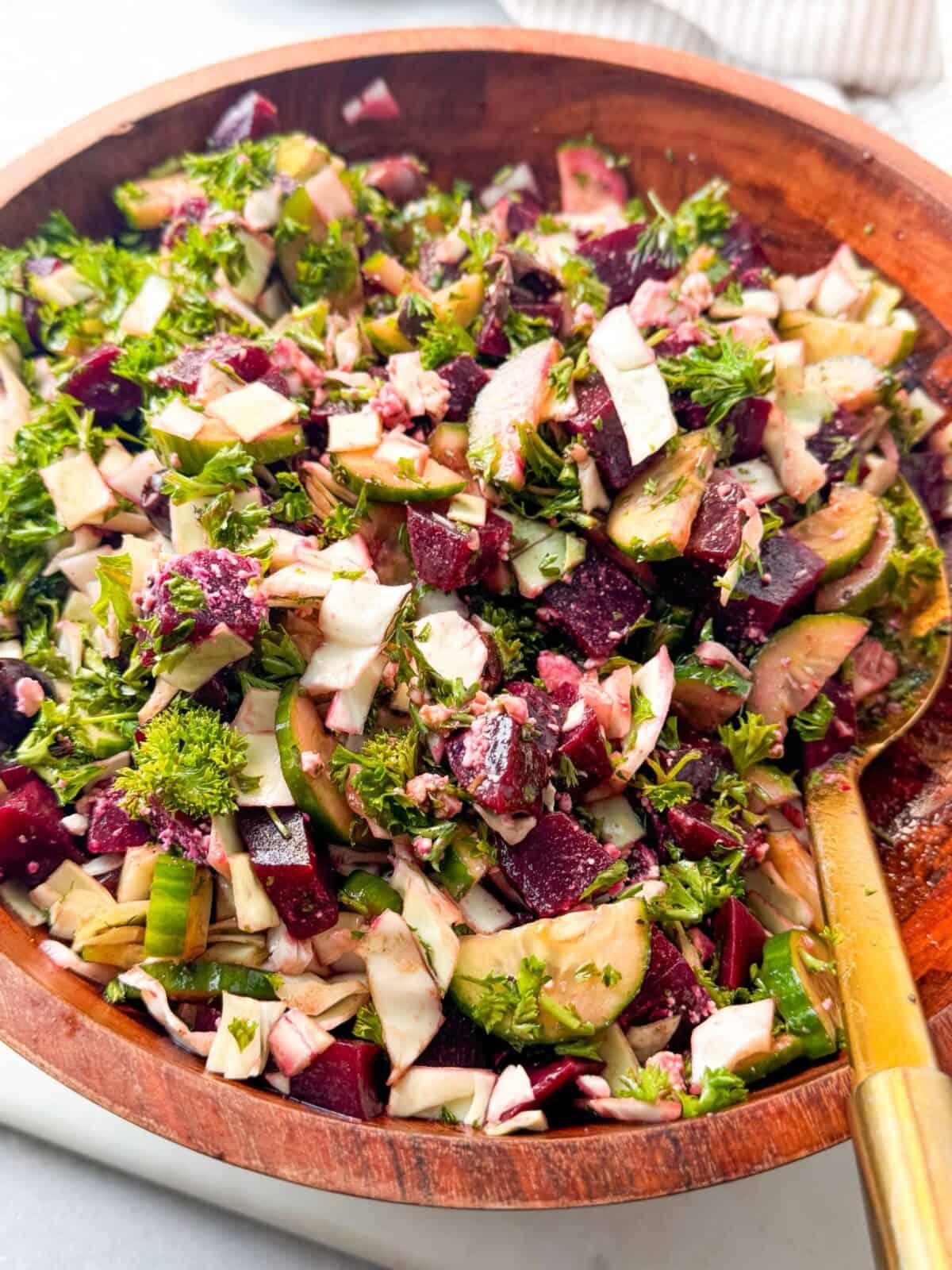 Refreshing Beet Cucumber and Feta Salad Close-up of refreshing beet, cucumber, and feta salad tossed in vinaigrette.