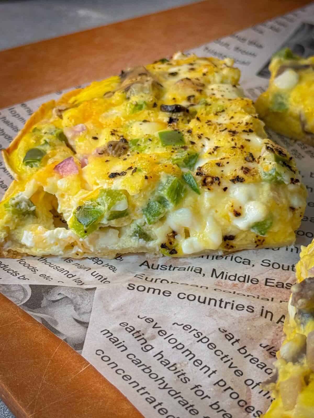 Cottage Cheese Tortilla Quiche Slice of Egg Tortilla Breakfast Bake with fluffy eggs, veggies, and melted cheese – one of the best easy cottage cheese recipes.