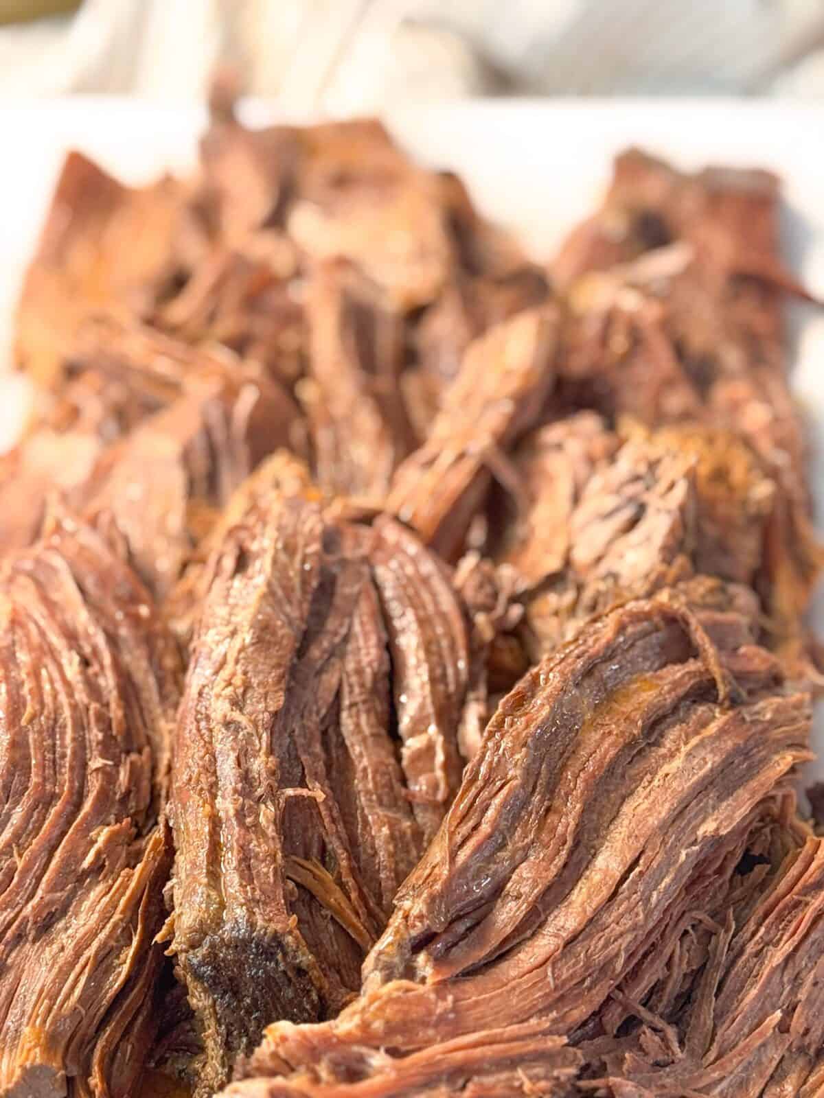 Instant Pot Roast Beef uicy and tender roast beef sliced and served on a platter