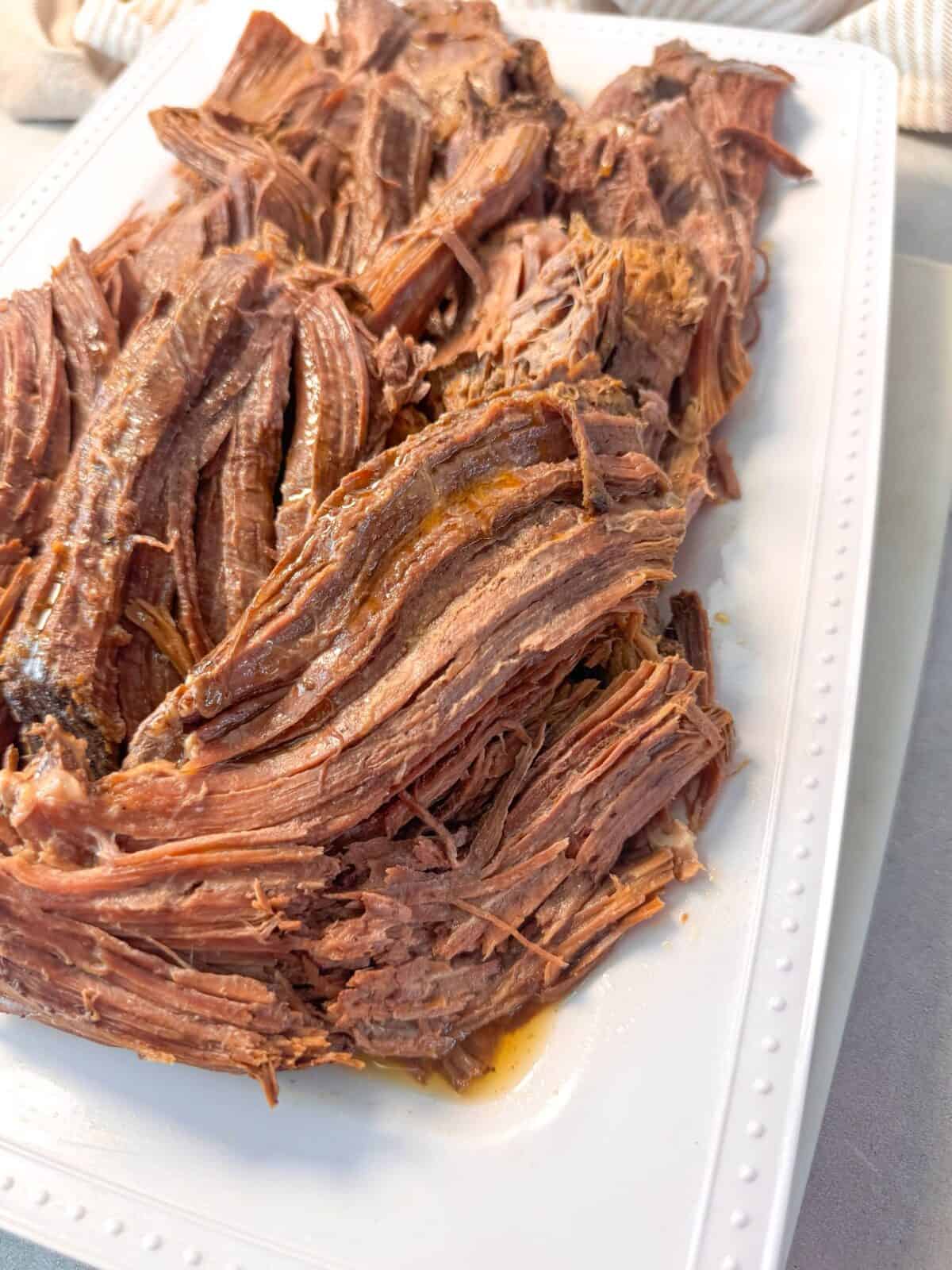 Tender Roast Beef Recipe tender roast beef cooked in the instant pot ready to be served